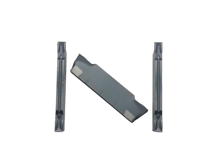 O carboneto de tungstênio feito sob encomenda que sulca inserções utiliza ferramentas a cor do preto de MGMN150-G